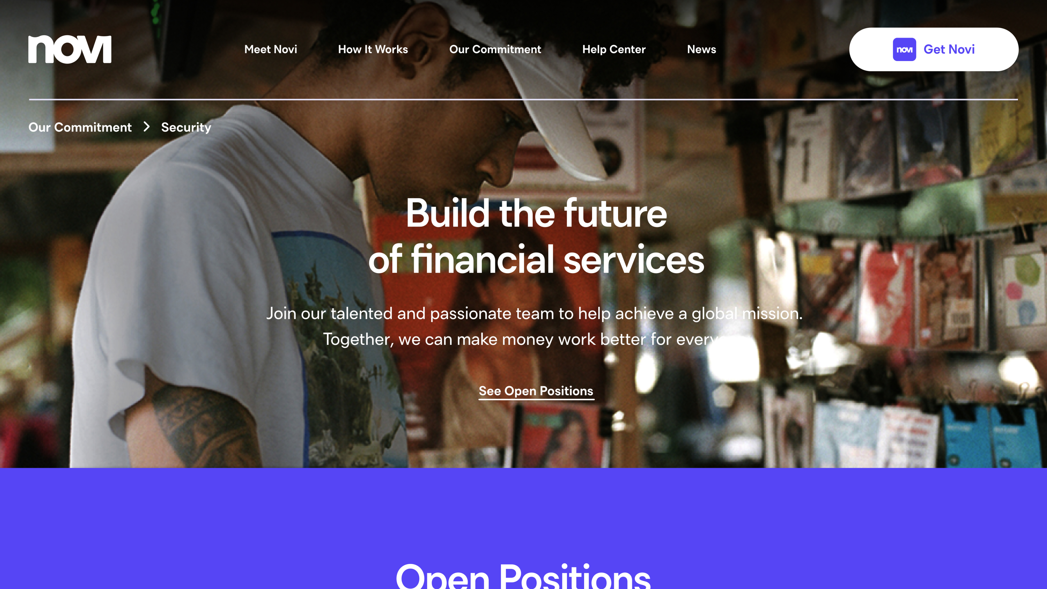 man walking in front of textured wall