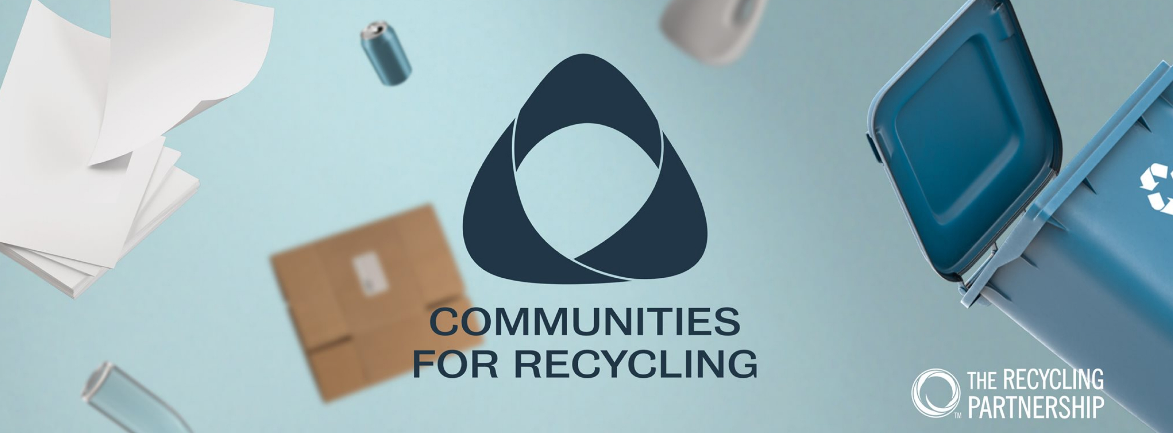 two people sitting on a ledge talking